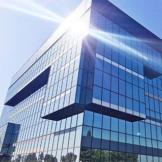 Image of a building having protective glasses covered from outside